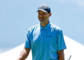 Former NFL football player Tony Romo reacts after making a putt on the 17th green during Round One of the 2022 American Century Championship at Edgewood Tahoe Golf Course on July 8, 2022, in Stateline, Nevada.