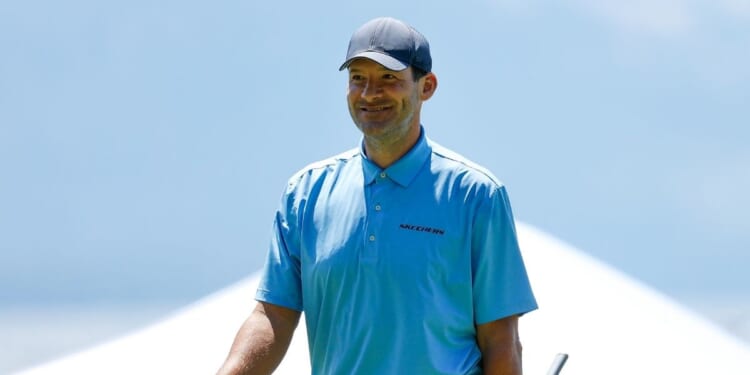 Former NFL football player Tony Romo reacts after making a putt on the 17th green during Round One of the 2022 American Century Championship at Edgewood Tahoe Golf Course on July 8, 2022, in Stateline, Nevada.