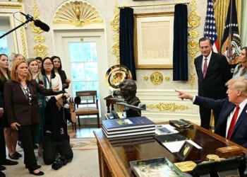 President Donald Trump takes a question from NBC reporter Kelly O'Donnell Sept. 18 in the Oval Office of the White House in Washington, D.C.