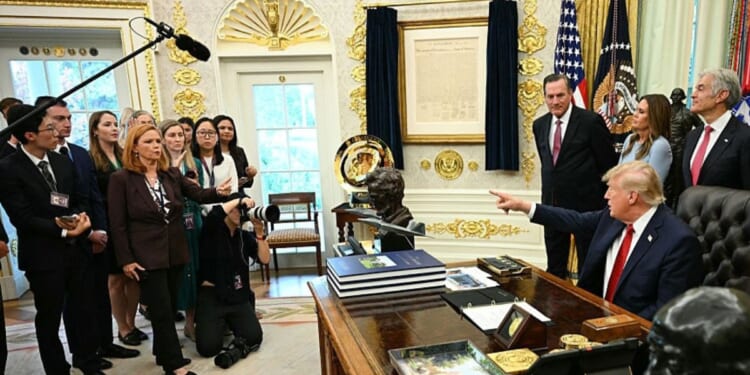 President Donald Trump takes a question from NBC reporter Kelly O'Donnell Sept. 18 in the Oval Office of the White House in Washington, D.C.