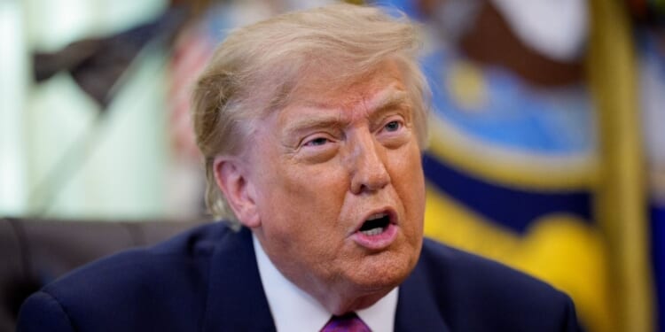 President Donald Trump speaks during an event Thursday in the Oval Office of the White House in Washington, D.C.