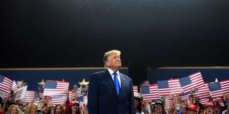 President Donald Trump walks on stage to speak on the first day of the 2026 Republican National Convention at the American Airlines Center on Sept. 9, 2026, in Dallas, Texas.
