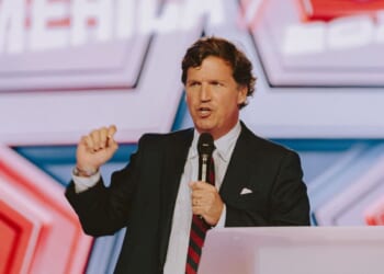 Conservative political commentator and podcast host Tucker Carlson speaks at Turning Point USA's annual AmericaFest conference, in remembrance of late right-wing political activist Charlie Kirk, in Phoenix, Arizona, on Dec. 18, 2025.