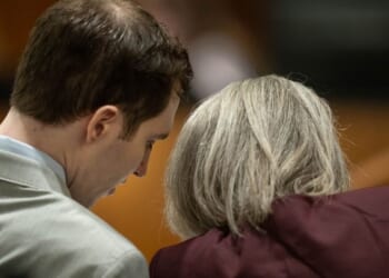 Tyler Robinson, charged in the fatal shooting of Charlie Kirk, speaks with defense attorney Staci Visser as he sits during a preliminary hearing in 4th District Court Tuesday in Provo, Utah.