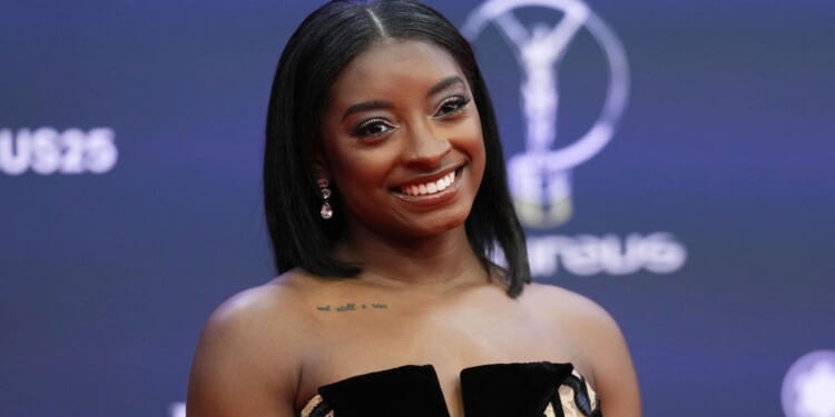 U.S. Olympian Simone Biles says masked men stole her Porsche from former Chicago residence