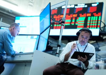 U.S. stocks slip after bond yields jump on higher oil prices and a strong economic report