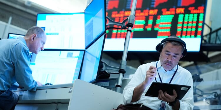 U.S. stocks slip after bond yields jump on higher oil prices and a strong economic report