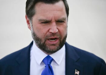 Vice President J.D. Vance talks to reporters on Sept. 21 before boarding Air Force Two at Joint Base Andrews, Maryland.