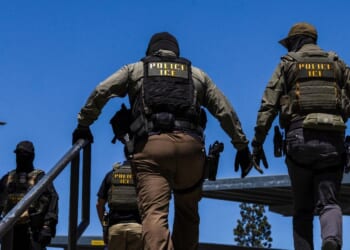 Immigration and Customs Enforcement agents walk outside the Ventura County Government Center in Ventura, California, on July 27, 2026.