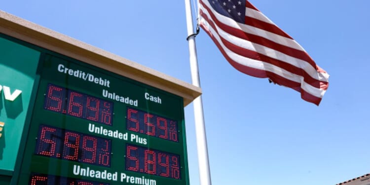 A gas meter is displayed beside an American flag on May 11, 2026 in Arcadia, California.