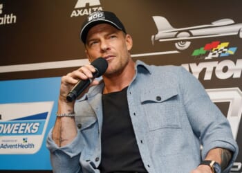 Alan Ritchson speaks to the media during a press conference prior to the NASCAR Cup Series Daytona 500 at Daytona International Speedway on Feb. 16, 2025, in Daytona Beach, Florida.