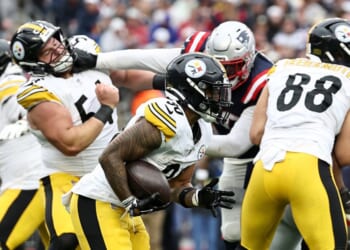 T.J. Watt of the Pittsburgh Steelers runs the ball during the second half of the game against the New England Patriots at Gillette Stadium on Sept. 20, 2026, in Foxborough, Massachusetts.