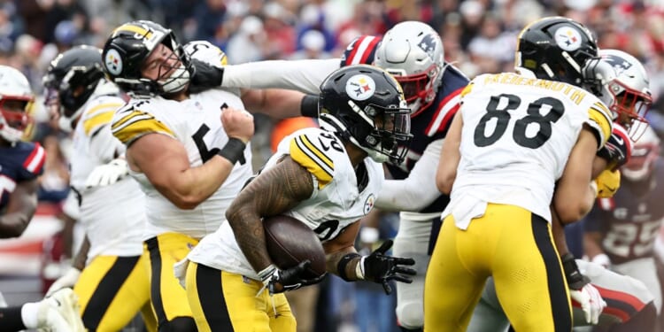T.J. Watt of the Pittsburgh Steelers runs the ball during the second half of the game against the New England Patriots at Gillette Stadium on Sept. 20, 2026, in Foxborough, Massachusetts.