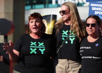 Amy Sousa speaks in front of Moda Center in Portland, Oregon, on July 31, 2026.